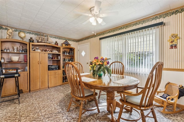 dining space featuring ceiling fan