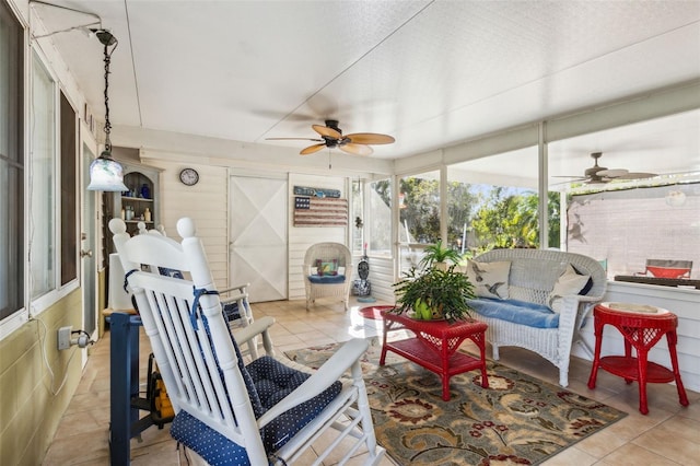 sunroom / solarium with ceiling fan