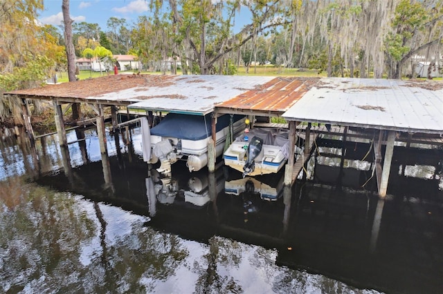 view of dock with a water view