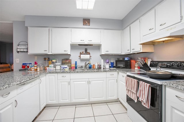 1571 S Boundary St, Deland, FL 32720 - kitchen featuring electric range, white dishwasher, under cabinet range hood, black microwave, and a sink
