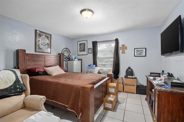 tiled bedroom with a textured ceiling