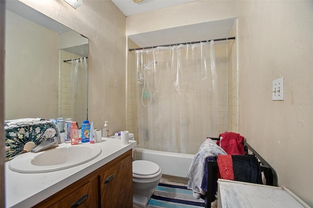 full bathroom with toilet, vanity, and shower / tub combo with curtain