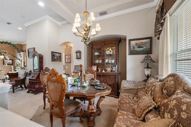 tiled dining room featuring ornamental molding and a notable chandelier