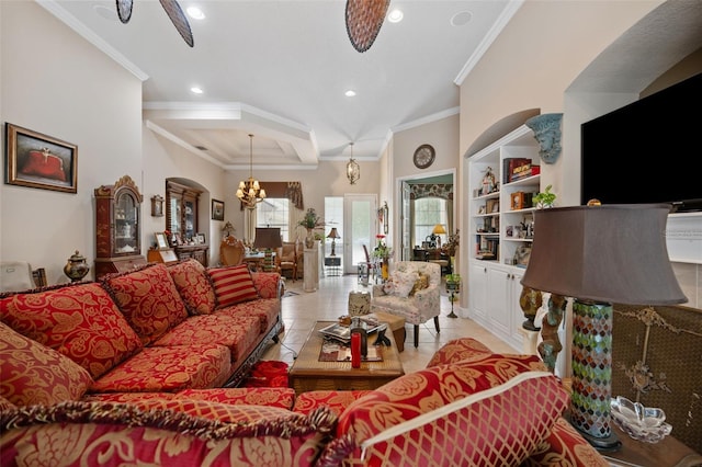 living room featuring light tile patterned flooring, ceiling fan with notable chandelier, and ornamental molding