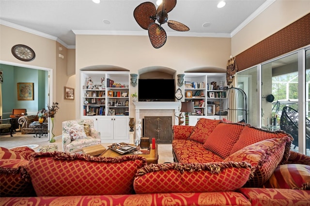 living room featuring ceiling fan and ornamental molding