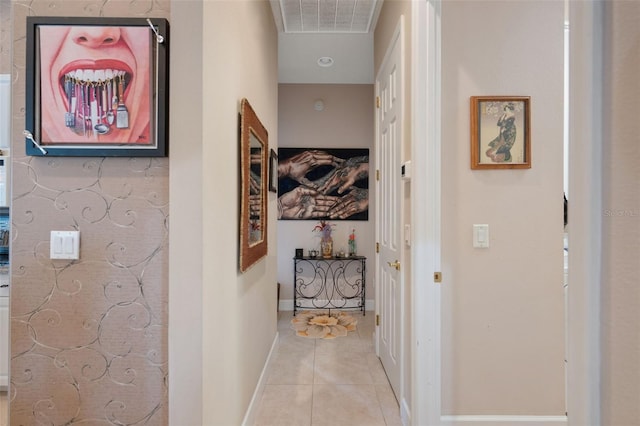 hallway with light tile patterned floors