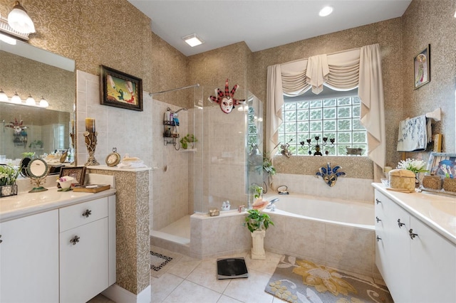 bathroom with separate shower and tub, tile patterned floors, and vanity