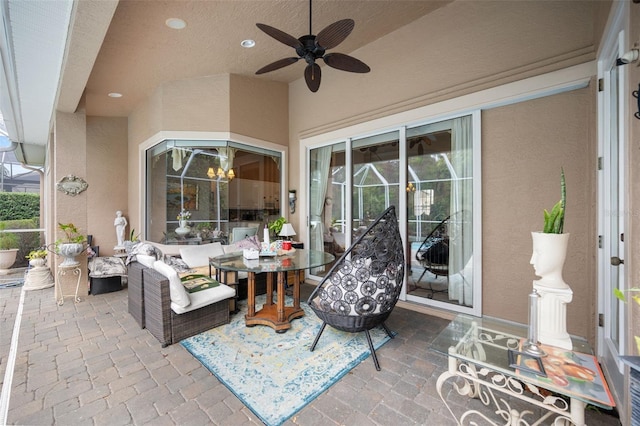 view of patio featuring an outdoor hangout area and ceiling fan