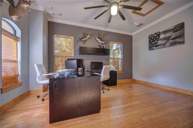 office with crown molding, ceiling fan, a textured ceiling, and light wood-type flooring