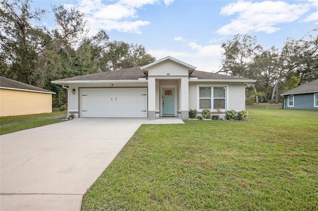 view of front of property featuring a front yard and a garage