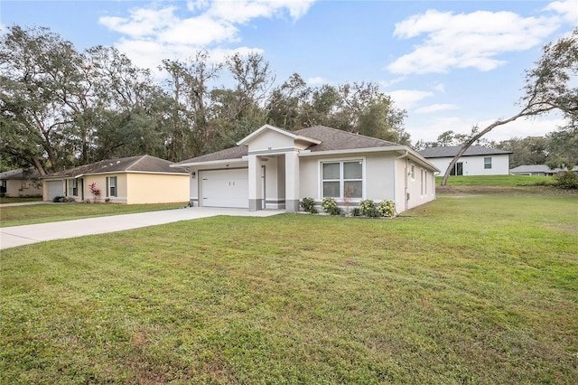 view of front of house featuring a front lawn and a garage