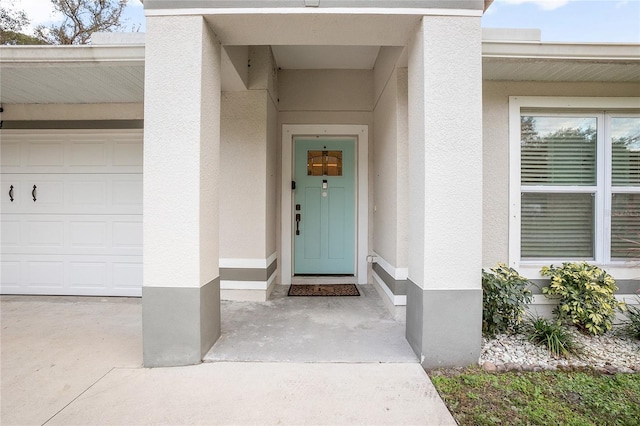 entrance to property with a garage