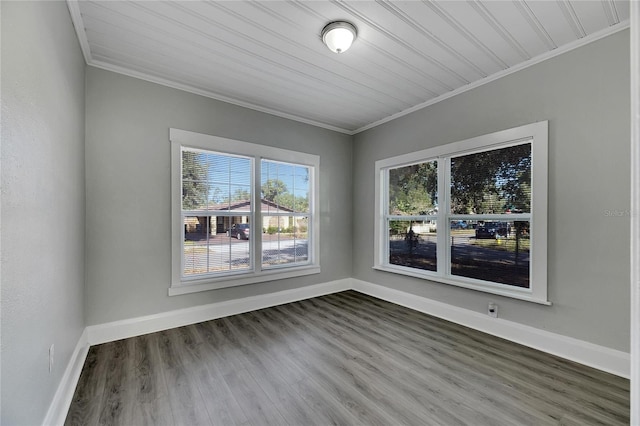 907 E N Bay St, Tampa, FL 33603 - empty room featuring crown molding, baseboards, and wood finished floors