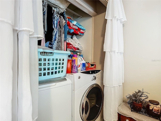 laundry area featuring washing machine and dryer