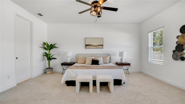 carpeted bedroom featuring ceiling fan