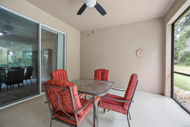 sunroom / solarium with ceiling fan