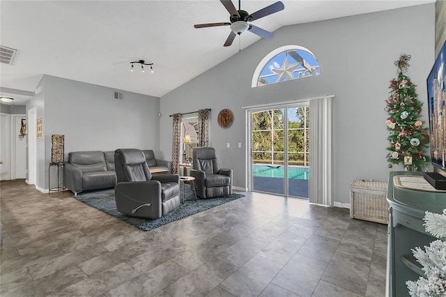 living room with high vaulted ceiling and ceiling fan