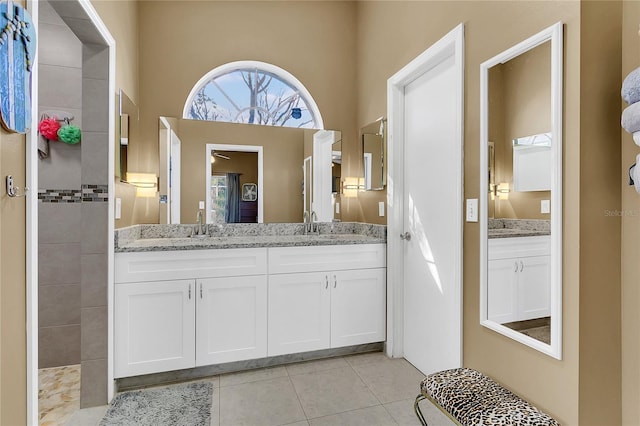 bathroom featuring tile patterned floors and vanity