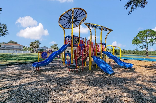 view of playground with a yard