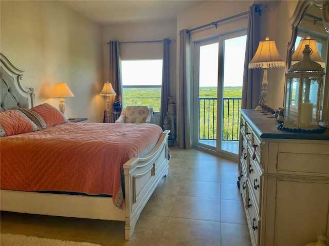 tiled bedroom with access to outside and multiple windows