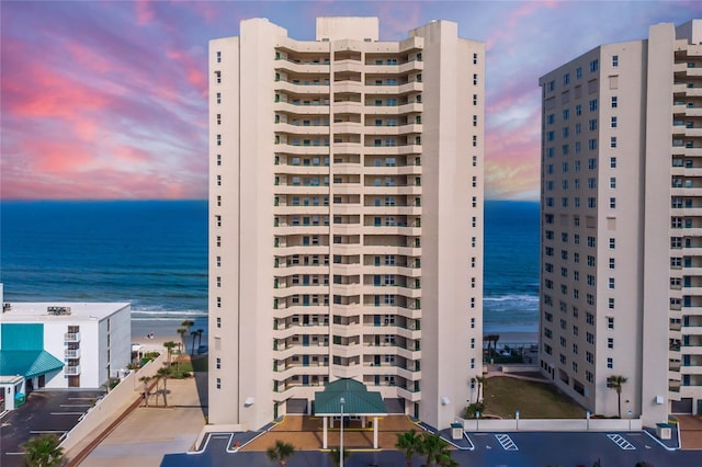 outdoor building at dusk with a water view