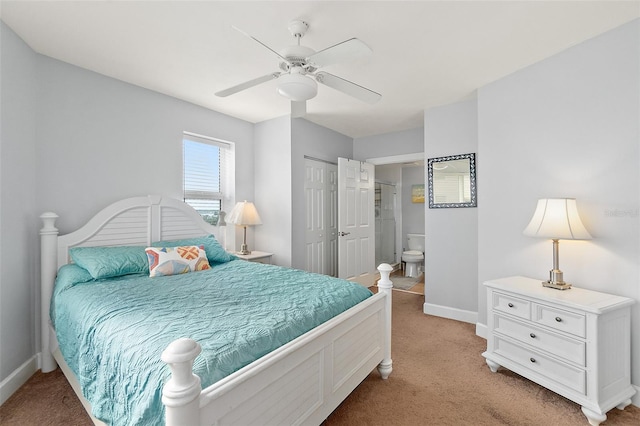 carpeted bedroom featuring ceiling fan and ensuite bathroom