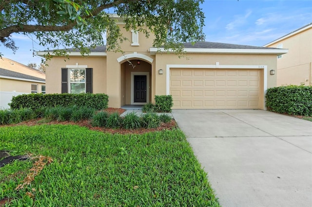 view of front of property featuring a garage