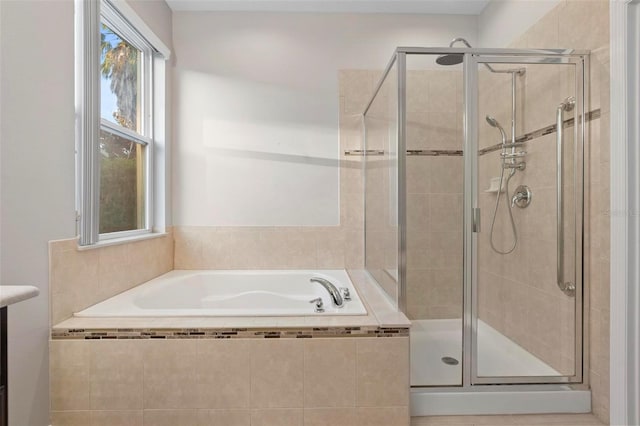 bathroom featuring plus walk in shower