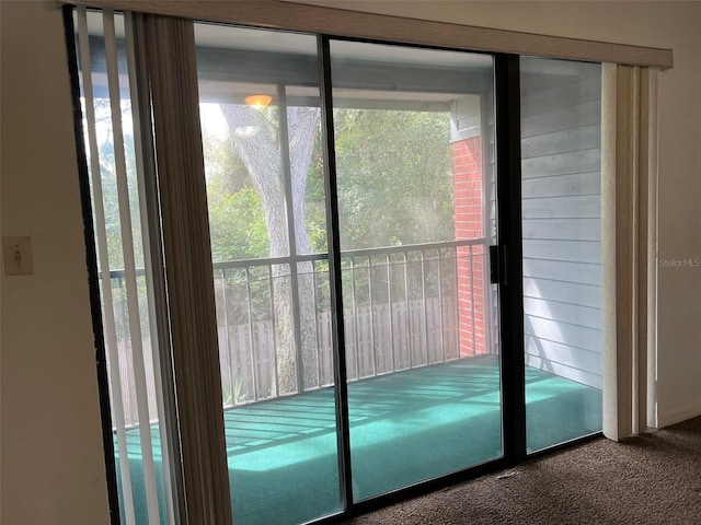 entryway featuring carpet floors