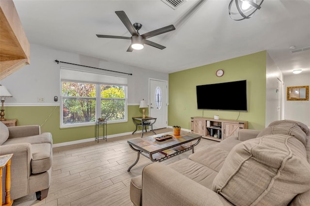 living room with ceiling fan