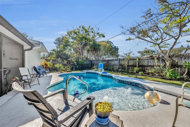 view of swimming pool featuring a patio area