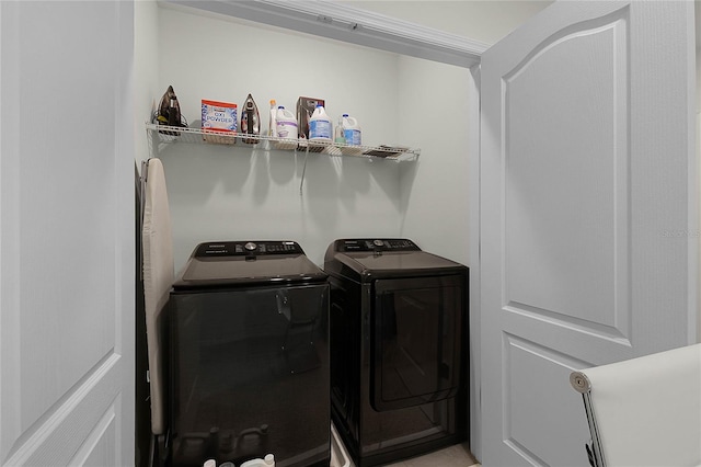 laundry room with washer and clothes dryer