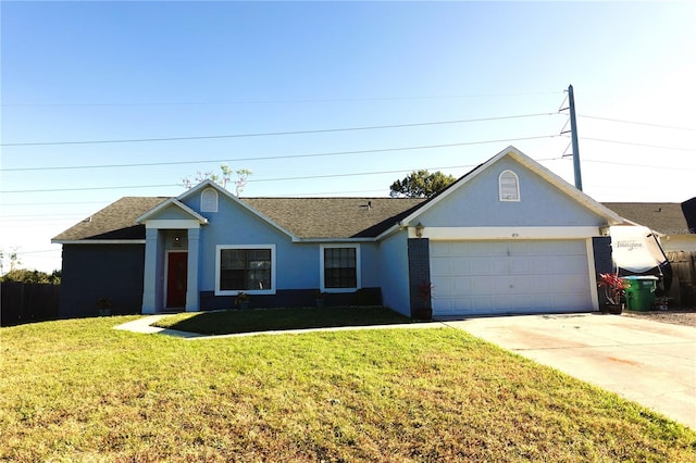 ranch-style house featuring a garage and a front lawn