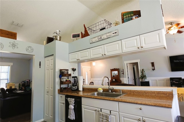 kitchen with ceiling fan, dishwasher, sink, a textured ceiling, and white cabinets