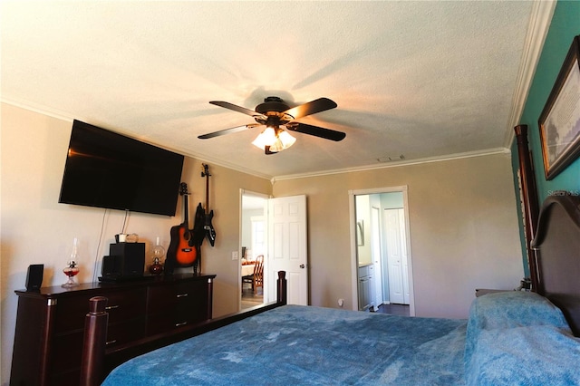 bedroom featuring a textured ceiling, ensuite bath, ceiling fan, and crown molding