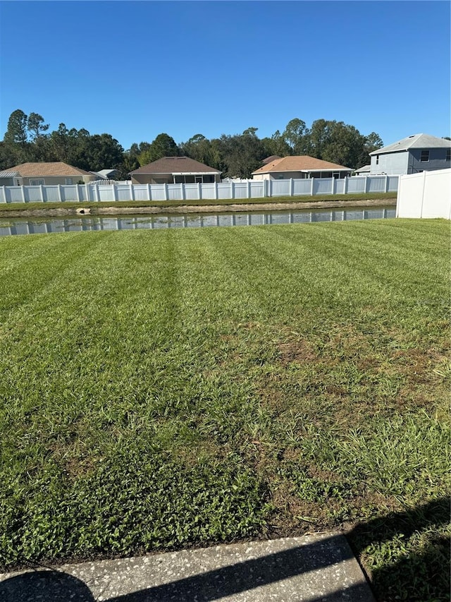 view of yard with a water view