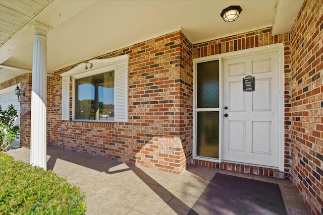 property entrance with a porch