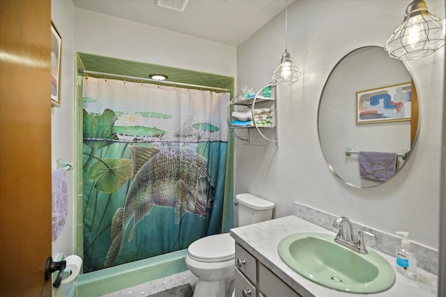 1639 Templewood Ave, Deltona, FL 32725 - bathroom with toilet, vanity, and a shower with curtain