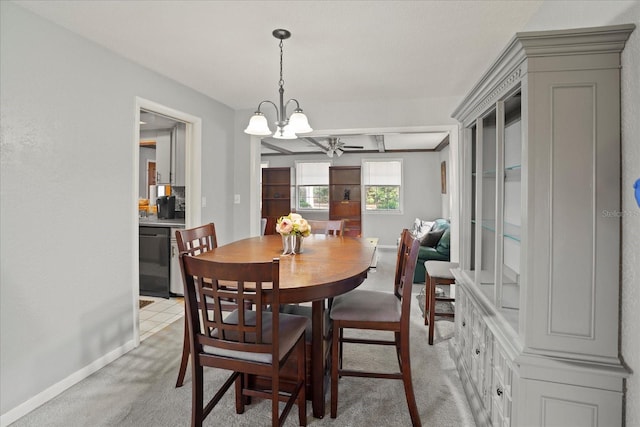 1639 Templewood Ave, Deltona, FL 32725 - dining area featuring light carpet, a chandelier, and baseboards