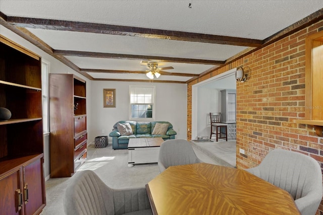 1639 Templewood Ave, Deltona, FL 32725 - carpeted living area with a ceiling fan, beam ceiling, a textured ceiling, and brick wall