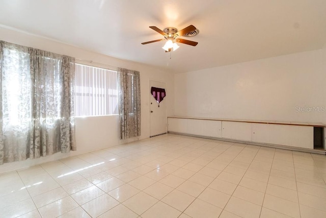 1068 N St, Daytona Beach, FL 32114 - unfurnished room with ceiling fan and light tile patterned flooring