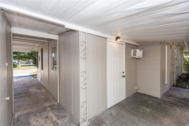 hall with a wall mounted air conditioner