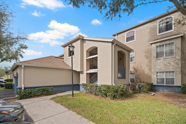 exterior space featuring a front yard