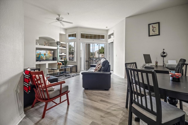 interior space featuring wood-type flooring and ceiling fan