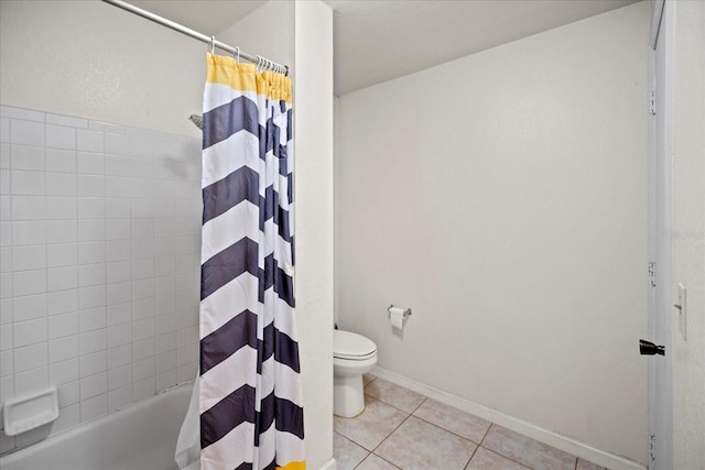 bathroom featuring tile patterned floors, shower / bath combination with curtain, and toilet