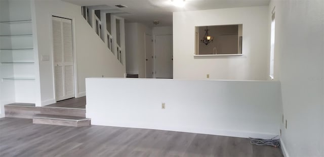 empty room with dark wood-type flooring