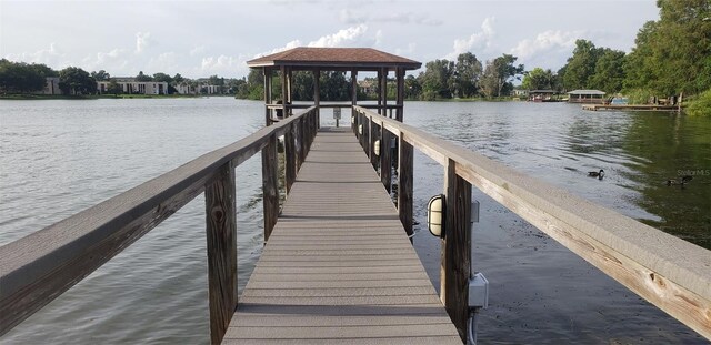 dock area featuring a gazebo and a water view