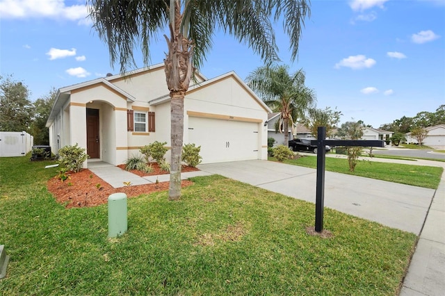 single story home with a garage and a front lawn