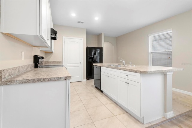 kitchen with sink, white cabinetry, a kitchen island with sink, black fridge with ice dispenser, and stainless steel dishwasher