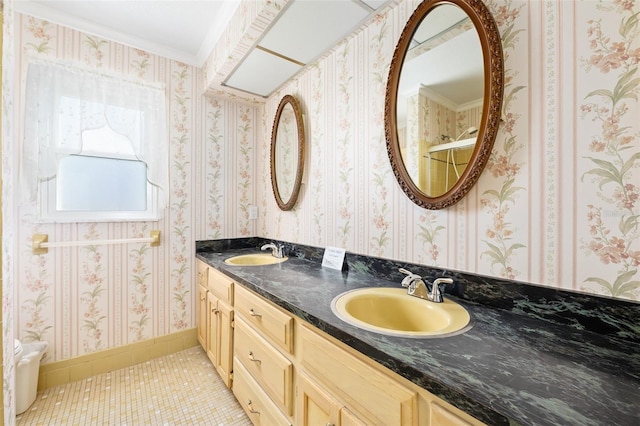 bathroom with tile patterned flooring and vanity